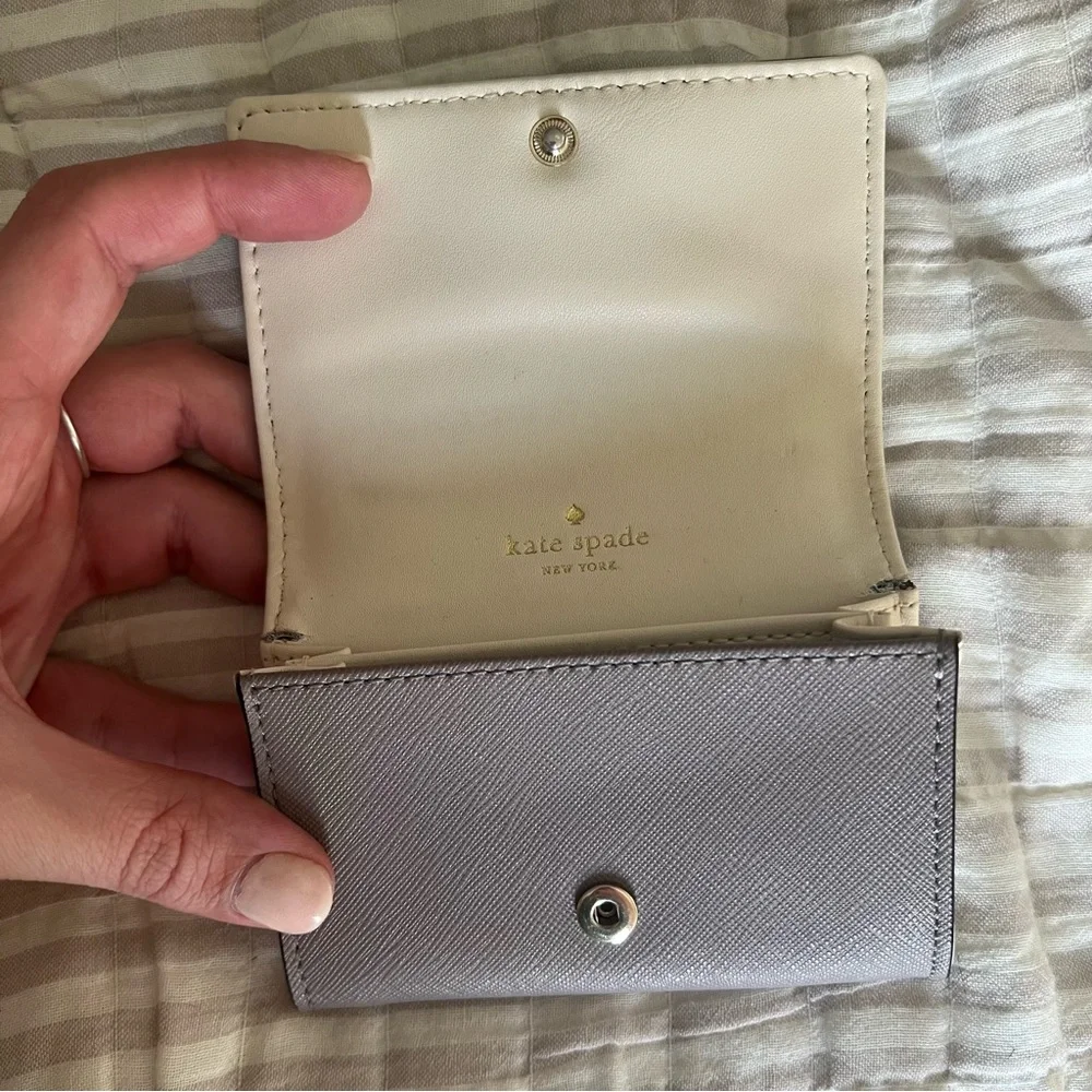 kate spade taupe leather compact wallet with gold logo